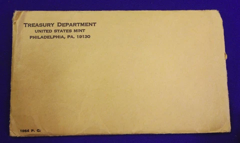 1964 U.S. PROOF SET. The envelope containing the set is sealed/unopened Cover