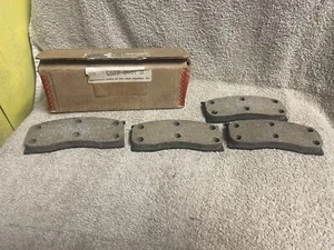 NOS FORD C5ZZ-2001-B 1965-66 MUSTANG SHELBY FRONT DISC BRAKE PADS (4 PIECES) - Picture 1 of 8