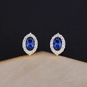 1CT Oval Lab-Created Blue Sapphire Stud Earrings 14k White Gold Plated Silver