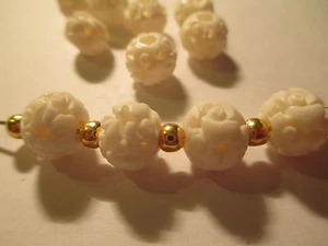 24 Intricately Carved Bead 8x7 mm C30 - Picture 1 of 2