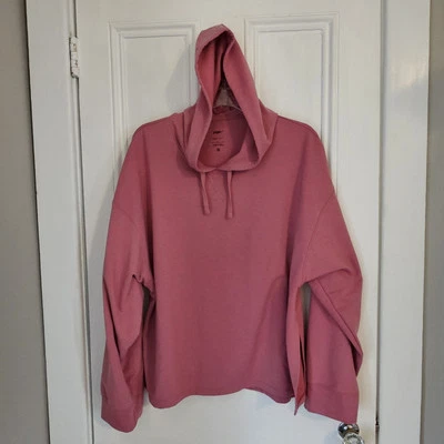 Sudadera con capucha grande para mujer Nike Yoga Dri Fit rosa DM7033-073 rendimiento relajado Foto 1 de 4