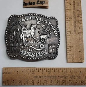 1985 NATIONAL FINALS RODEO - HESSTON - Calf Roping - Belt BUCKLE -listing #7724 - Picture 1 of 9