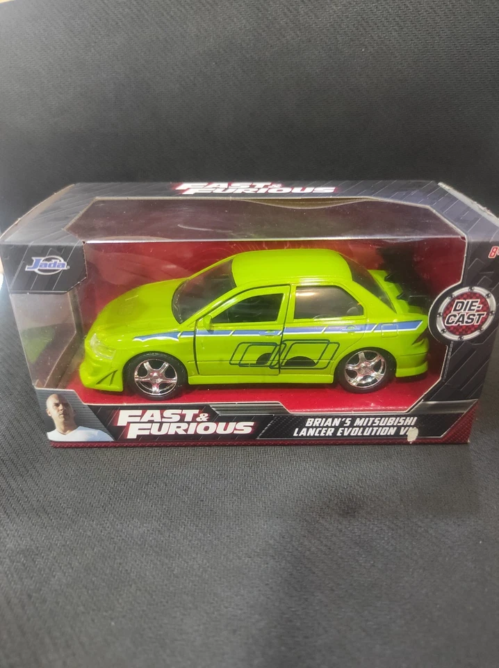 MITSUBISHI LANCEREVOLUTION VII BRIAN`S FAST&FURIOUS 1/32 JADA NUOVA SIG. - Immagine 1 di 1