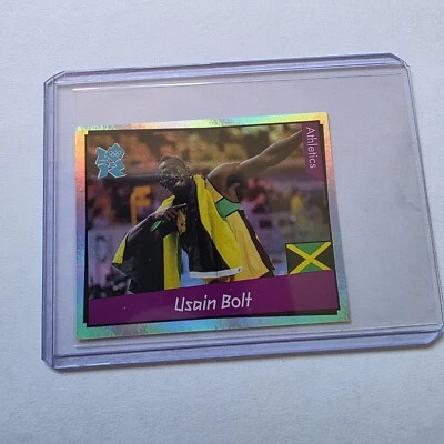 USAIN BOLT # 65 FOIL RC ROOKIE - PEGATINAS PANINI OLÍMPICAS 2012 - ATLETISMO CABRA Foto 1 de 4