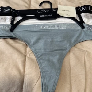 WOMENS CALVIN KLEIN THONG UNDERWEAR 3 PAIR BLUE WHITE BLACK PANTIES SIZE MEDIUM - Picture 1 of 9