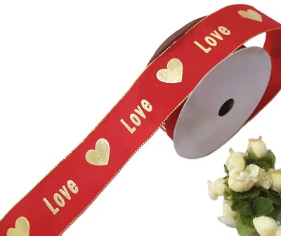 1-1/2" 38nn wide -9-10yds Gold Heart & Love Printed on Red Ribbon Wired Edge PR1 - Image 1 of 4