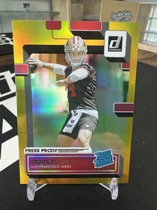 2022 Donruss Brock Purdy Rated Rookie Press Proof Premium #374 - Bild 1 von 2