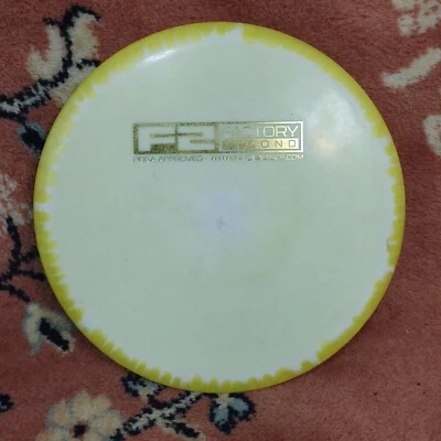 USED Innova Halo Star Lion F2 182g White Yellow Foil A Midrange Golf Disc Inked - Image 1 of 4