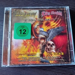 LAAZ ROCKIT - CD + DVD - Taste of Rebellion & Live Untold - Sehr Gut - Imagen 1 de 2