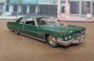 Greenlight 1971 Cadillac Coupe DeVille Lowrider in Green 1/64 Rubber Tires - Picture 1 of 5