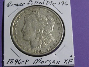 1896-P $1 Morgan Silver Dollar #196 Grease Filled Die Error Coin - XF+ - Picture 1 of 2