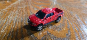 Maisto Rot Ford F-150 SVT Raptor Maßstab 1:64 Druckguss Fahrzeug China 3" Spielzeug Truck - Bild 1 von 2
