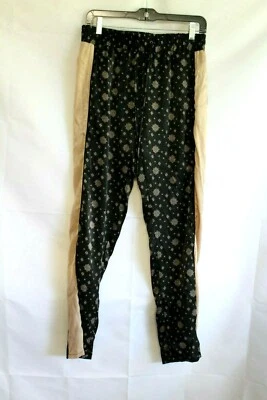 Pantalón BEBOP (M) NEGRO/DORADO Satinado Poliéster Cintura Elástica Cordón Precio de venta sugerido por el fabricante 39,00 USD Foto 1 de 4