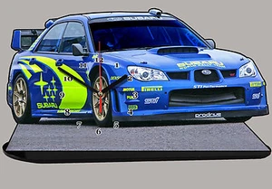 AUTO RALLYE MINIATURE, SUBARU WRC-01 en horloge - Foto 1 di 1