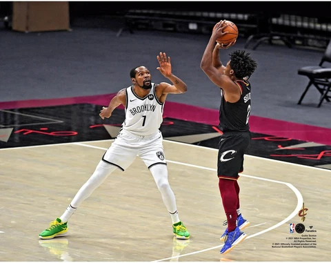 Collin Sexton Cavaliers Unsigned Second-Overtime Three-Pointer vs Nets Photo Cover