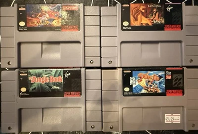 Disney super nintendo game LOT (Pinocchio, The Jungle Book, Aladdin, Lion King - Image 1 of 4