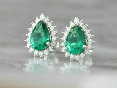 Серьги-гвоздики с имитацией зеленого изумруда грушевидной огранки 3 карата покрытие белым золотом 14 карат - Изображение 1 из 4