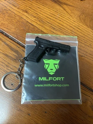 NEW 2025 SHOT SHOW Milfort Pistol Plastic KEYCHAIN Firearms Gun Military Decal - Image 1 of 3