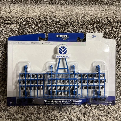 1/64 2007 ERTL NEW HOLLAND FOLDING FIELD CULTIVATOR NEW In Package! Hard To Find - Image 1 of 3