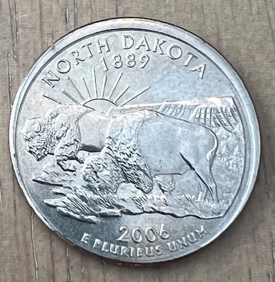 2006 D North Dakota STATE QUARTER STRUCK OFF CENTER ERROR & PARTIAL COLLAR TILT - Image 1 of 4