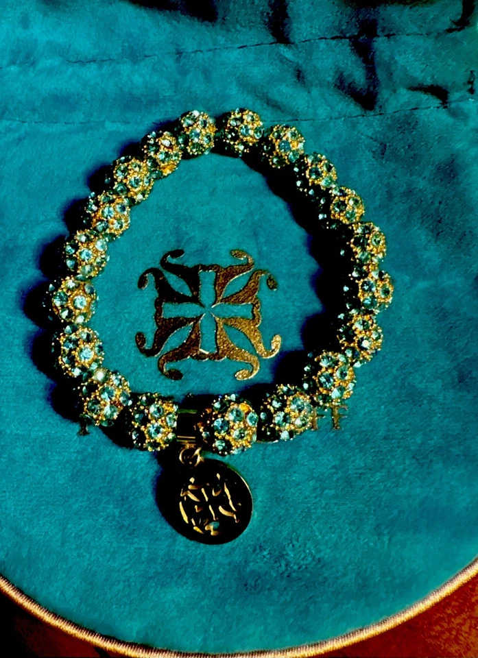 Brazalete rústico facetado: oro con juegos de verde azulado. Bolsa de terciopelo incluida: Kennedy Foto 1 de 4