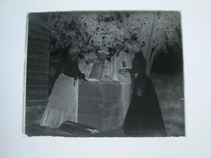 LATE 1800s or EARLY 1900s GLASS NEGATIVE, PEOPLE AROUND KEG DOING SOMETHING - Picture 1 of 1