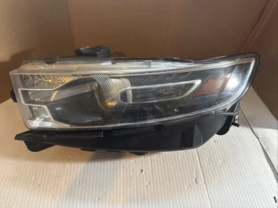 Faro halógeno del lado izquierdo del conductor Ford Taurus 2017 Foto 1 de 4