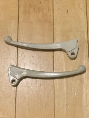 Par original de palancas marfil Honda Z50 Z50a K0 53175063000XL 53178063000XL Foto 1 de 2