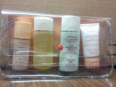 NUEVO CLARINS SET DE 4 PIEZAS SUERO, LOCIÓN LECHE LIMPIADORA Y CREMA DE DÍA EXTRA REAFIRMANTE Foto 1 de 4