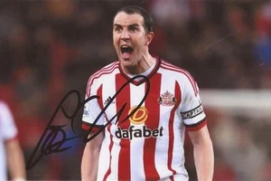 SUNDERLAND: JOHN O'SHEA SIGNED 6x4 ACTION PHOTO+COA - Picture 1 of 1