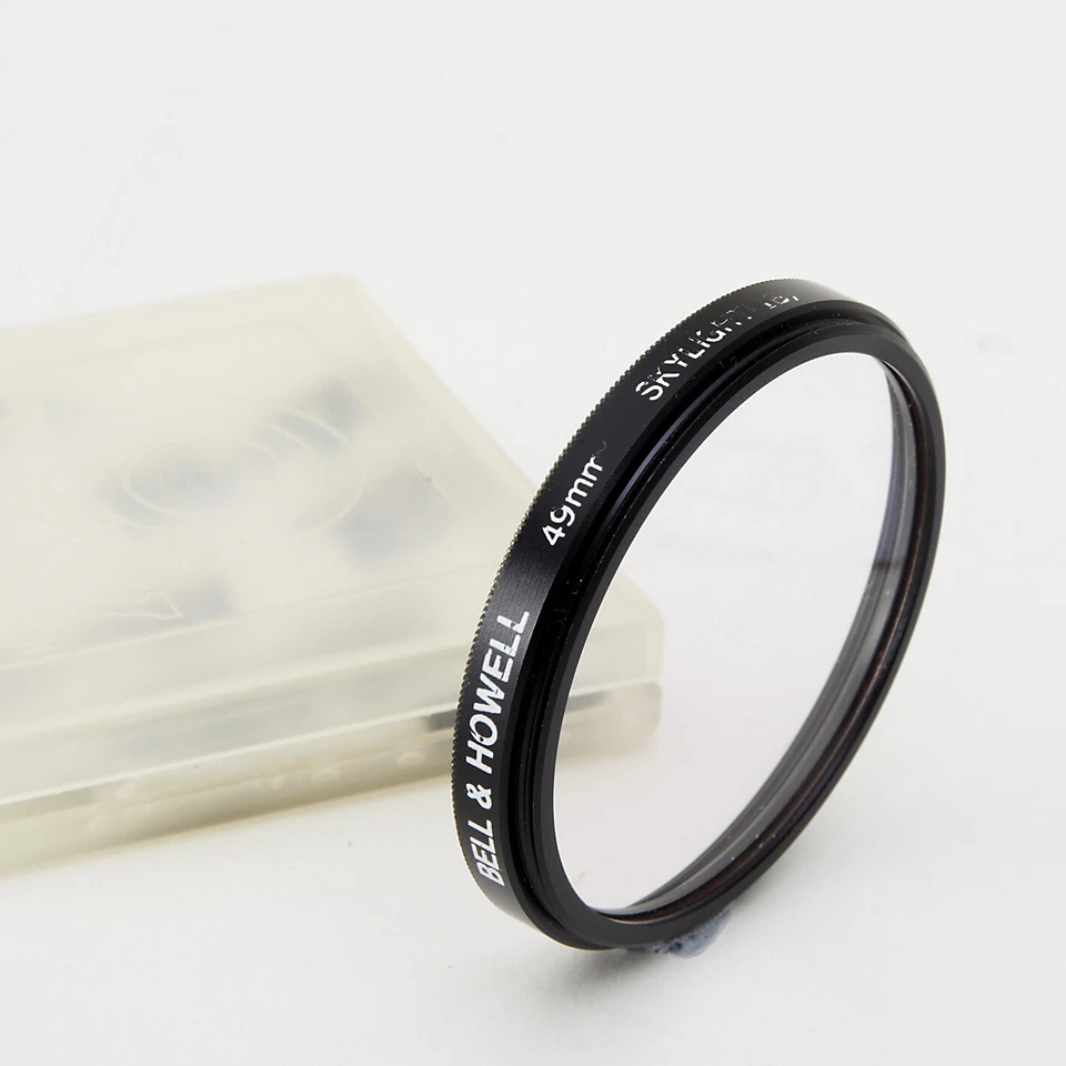 BELL & HOWELL 49mm SKYLIGHT (1B) FILTER IN CASE  #F9 - Image 1 of 1