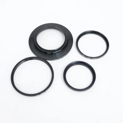 Various 5 piece Lens Filter Adapters 43-46, 49-52, 49-72, 52-72, 62-58 - Image 1 of 2