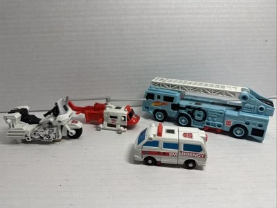 Vintage Hasbro Transformers Protectobot Fire Truck, MotorCycle, First Aid Lot - Image 1 of 4