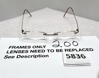 MARCHON AIRLOCK2 - 760 56 140 EYEGLASSES TITANIUM BROWN/BRONZE RIMLESS FRAME - Image 1 of 4