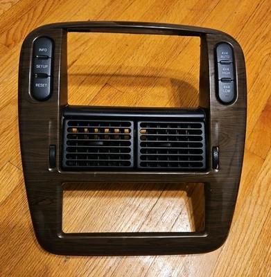 Ford Explorer 2002-2005 bisel para radio y control de clima con respiraderos - grano de madera Foto 1 de 4
