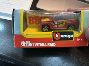 Burago - #4112 Suzuki Vitara Raid - Red "Kores 18" 1:43 - Rare - in box - Picture 1 of 1