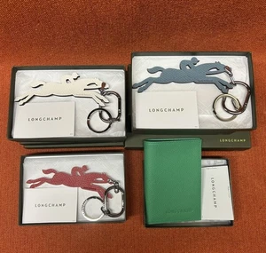 Longchamp Frankreich Pferd Schlüsselanhänger Taschenanhänger/Geldbörse 11 Stück Neu - Bild 1 von 14