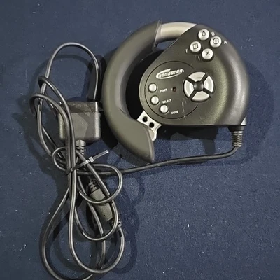 Vintage Radica Gamester “Pro-Racer” PS2 Handheld Steering Wheel Controller 2000 - Image 1 of 4