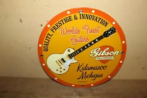 Guitarras eléctricas Gibson 1973 de colección instrumentos musicales 12" letrero de metal de porcelana - Imagen 1 de 4