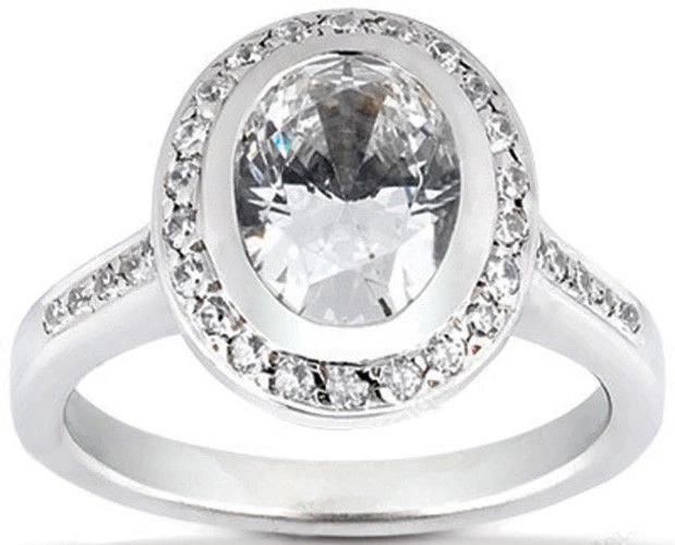 Anillo solitario de oro de 14 k con halo de diamantes en forma ovalada de 1,37 quilates y 1 quilate color G SI1 Foto 1 de 1