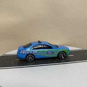 Hot Wheels 2011 2006-2012 Ford Fusion berlina ritmo auto blu e verde con OH5 1:64 NM - Foto 1 di 13