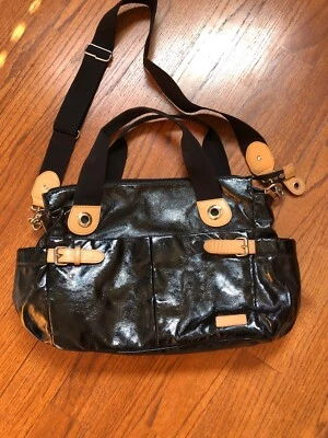 Bolso de bebé Storksak Kate charol PVC con ribete de cuero $237 Foto 1 de 4