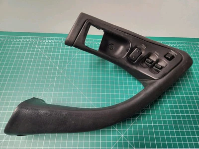 Interruptor de ventana principal del conductor Toyota Celica 1990-1993 con bisel y tirador de puerta pieza OEM Foto 1 de 4