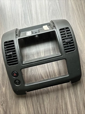 05-12 Nissan Xterra Pathfinder frontier painel central rádio moldura ventilação console fabricante de equipamento original - Imagem 1 de 4
