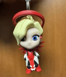 Blizzard Overwatch BlizzCon 2017 exclusivo colgador de mochila Red Mercy - Imagen 1 de 1