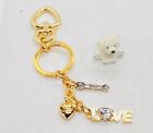 New, Juicy Couture LOVE Charm Keychain Gold Tone 6”x2” Cubic Zirconia Stone