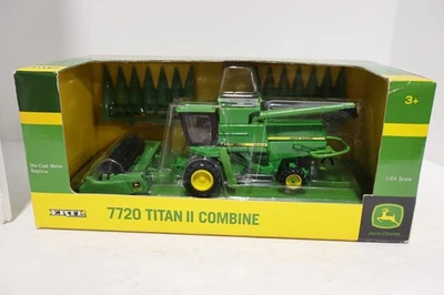 1/64 Ertl Farm Toy John Deere 7720 Titan II Combine  With 3 Heads - Image 1 of 3