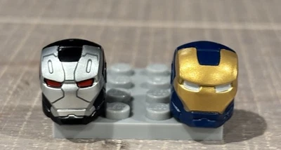 LEGO Marvel War Machine And Iron Legion Helmets.  Near Mint. - Image 1 of 4