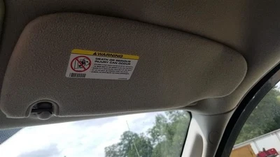 09 DODGE RAM 3500 SUN VISOR RIGHT PASSENGER GRAY QUAD CAB - Image 1 of 4