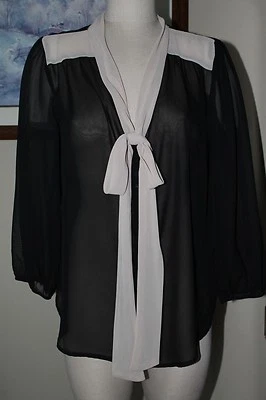 Blusa Lily Blanca Negra/Tostada XL Larga Manga Transparente Hecha en EE. UU. Precio de venta sugerido por el fabricante: $36 Ahora $19.99 Foto 1 de 4
